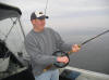 Brian Jung reeling in a Laker on the Johnson rod. Click image to enlarge. Hit back button to return.